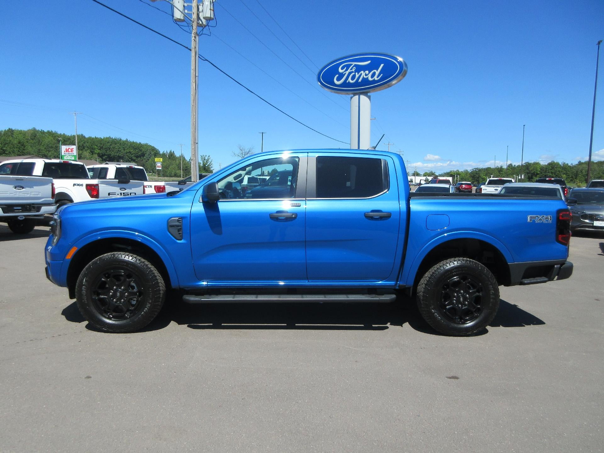 2025 Ford Ranger XLT 4WD SuperCrew 5' Box in Velocity Blue Metallic — front three-quarter view