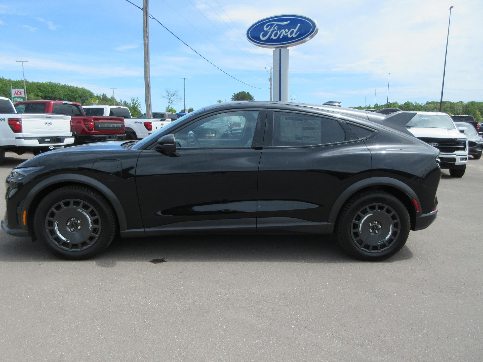 2025 Ford Mustang Mach-E GT AWD in Shadow Black — front three-quarter view