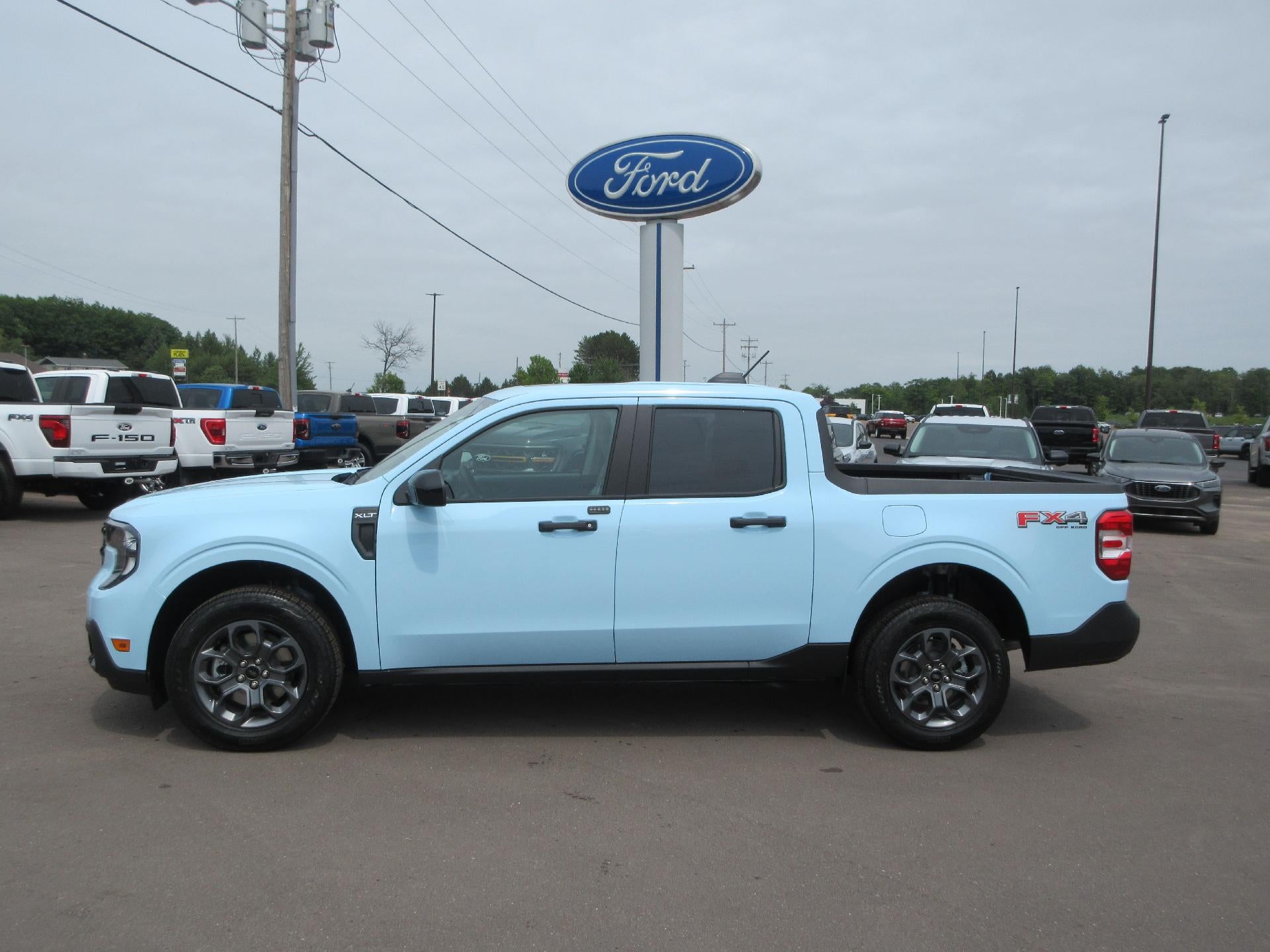 2026 Ford Maverick XLT AWD SuperCrew in Light Blue — front three-quarter view