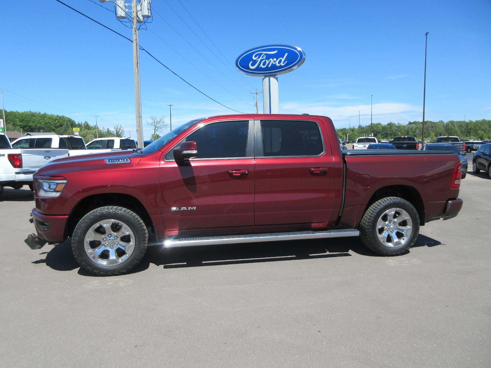 2019 RAM 1500 Big Horn/Lone Star 4x4 Crew Cab 5'7" Box in Red — front three-quarter view