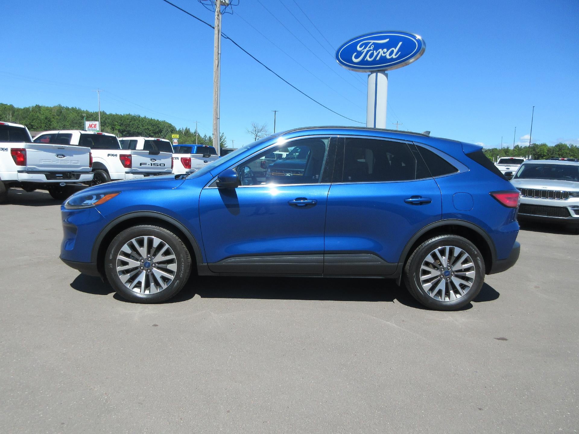 2022 Ford Escape Titanium AWD in Atlas Blue Metallic — front three-quarter view