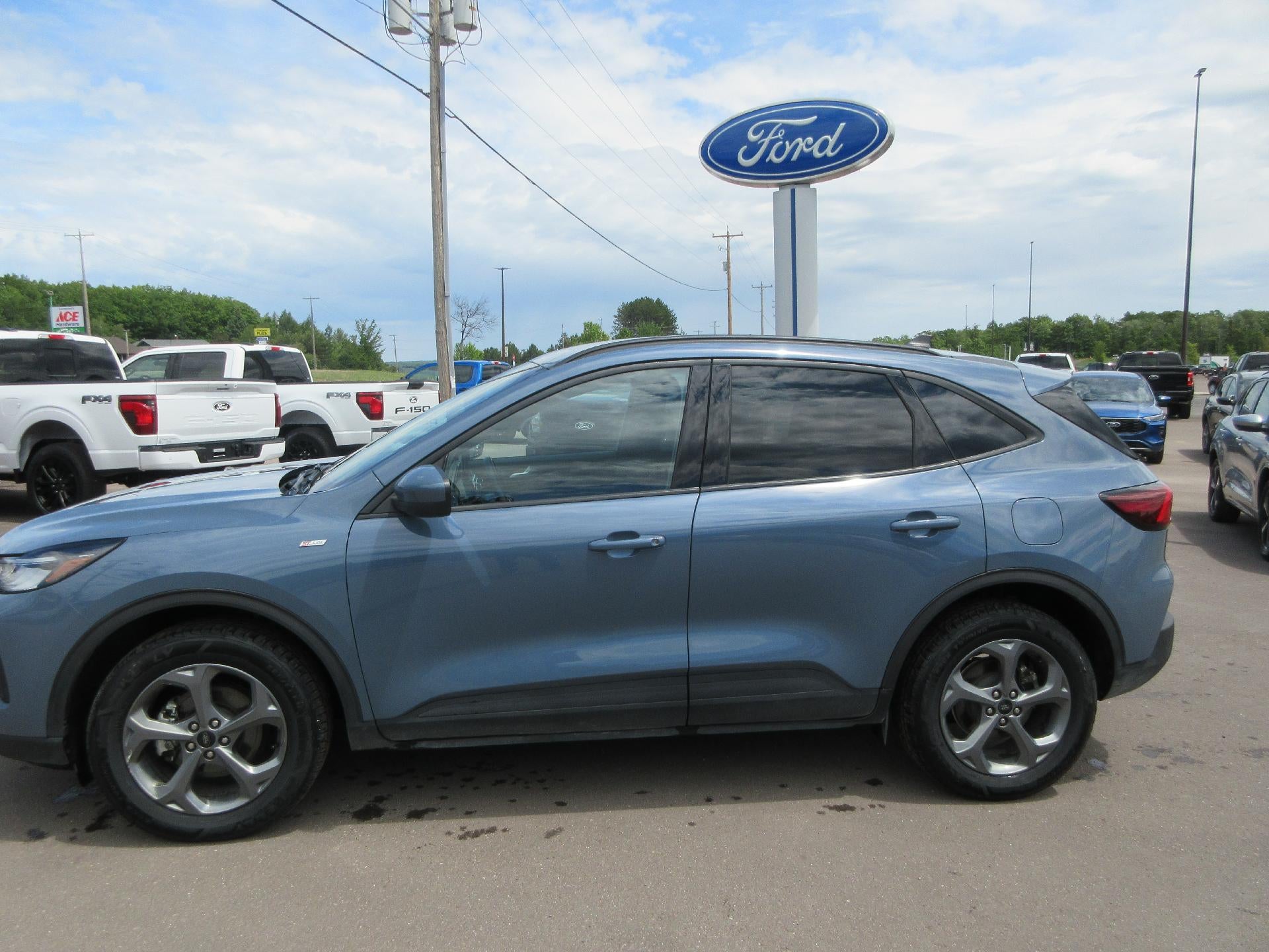 2025 Ford Escape ST-Line Select AWD in Vapor Blue Metallic — front three-quarter view