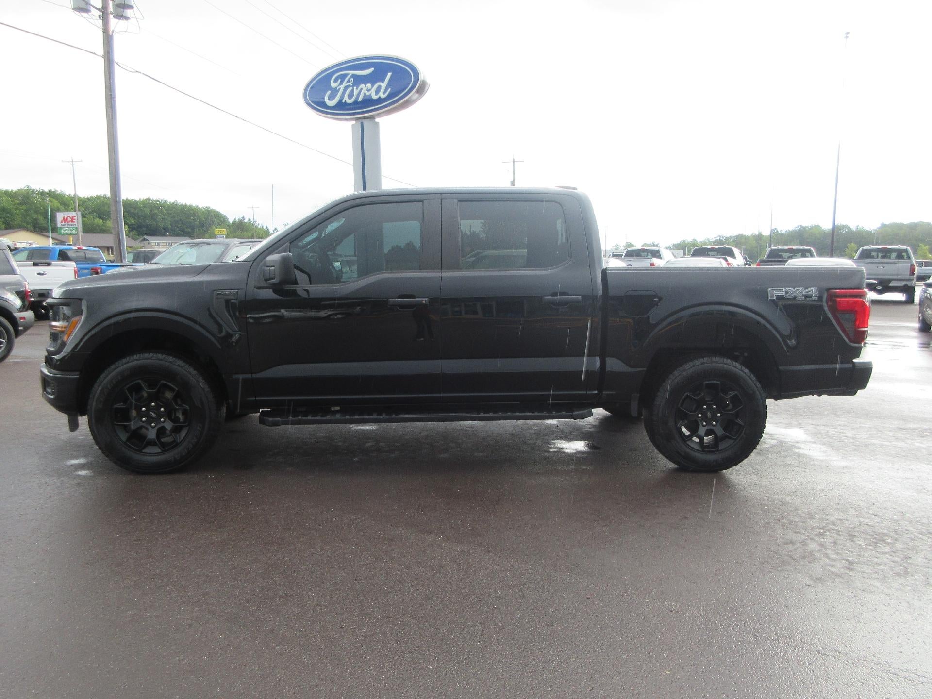 2024 Ford F-150 STX 4WD SuperCrew 5.5' Box in Agate Black Metallic — front three-quarter view