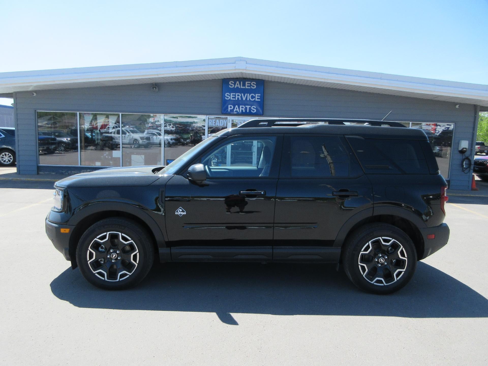 2025 Ford Bronco Sport Outer Banks 4x4 in Shadow Black — front three-quarter view