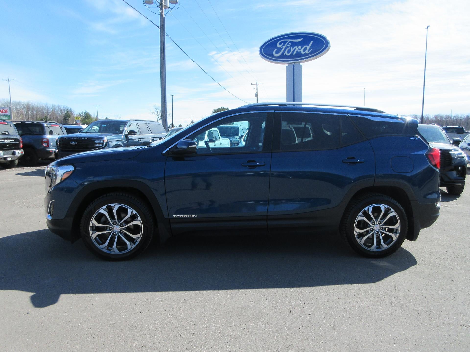2020 GMC Terrain AWD SLT in Blue Emerald Metallic — front three-quarter view