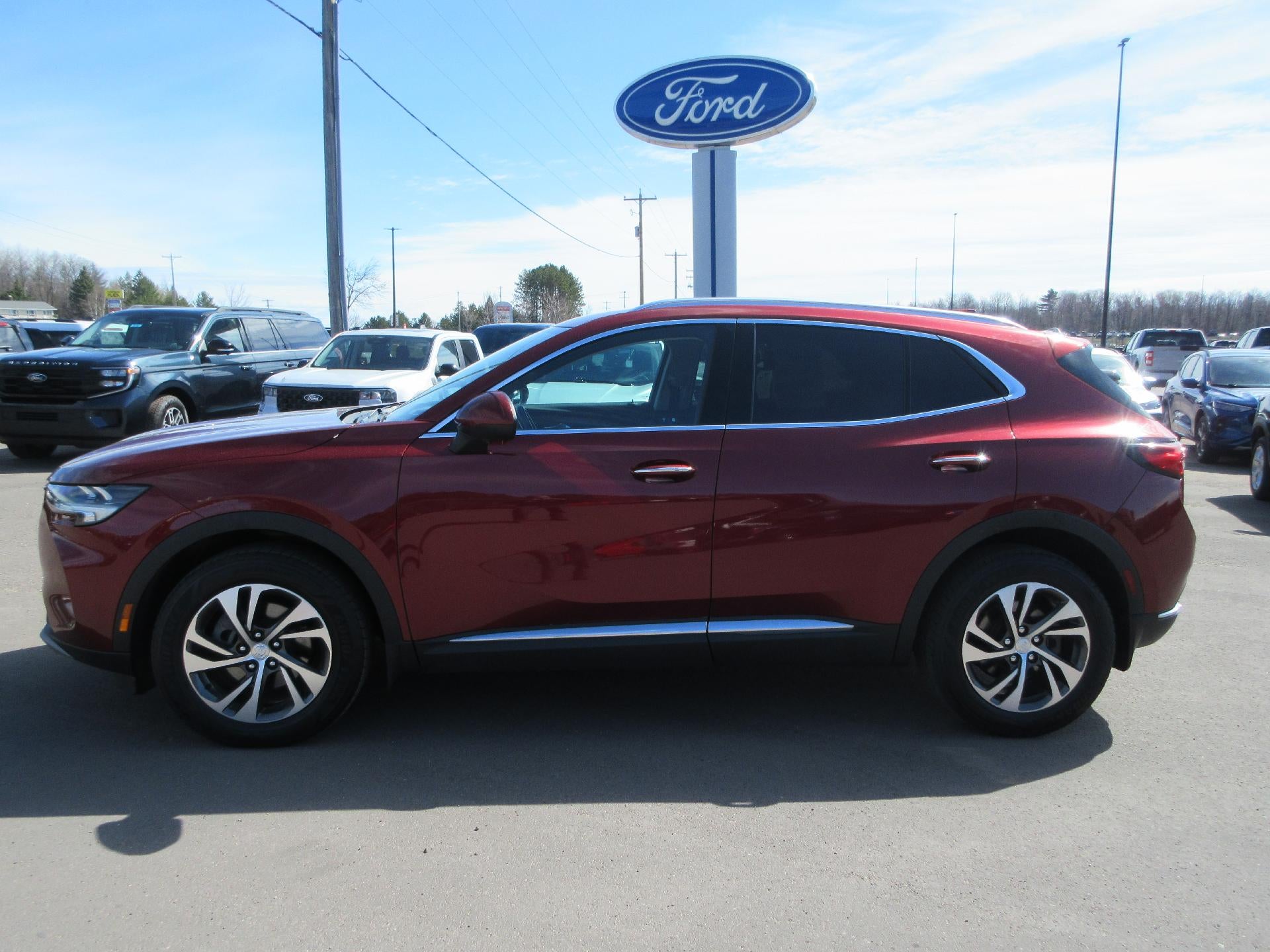 2021 Buick Envision AWD 4dr Essence in Red — front three-quarter view